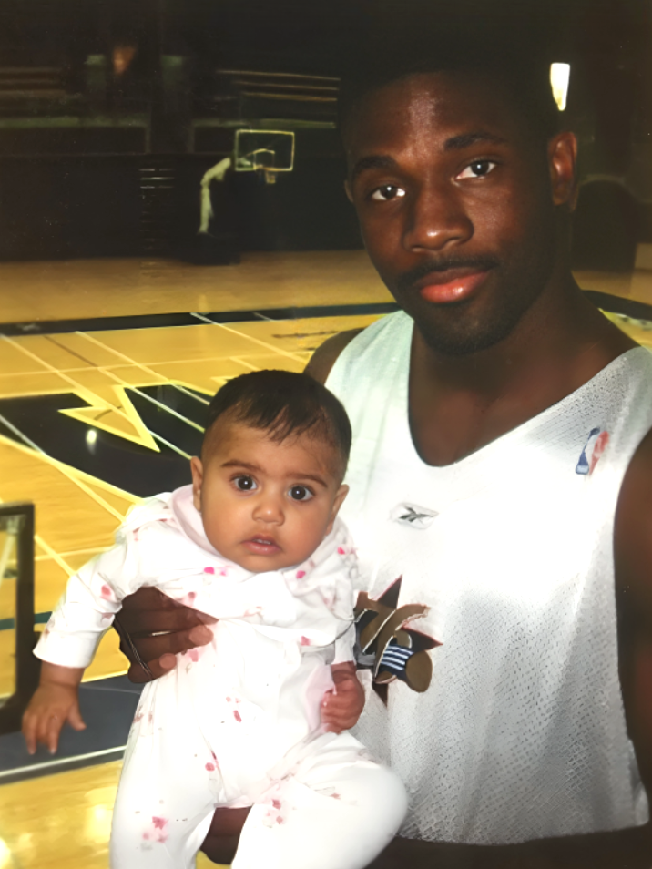 NBA star Bobby Jones and Liyana Islam on the day that Palash Islam signed him as his first client.