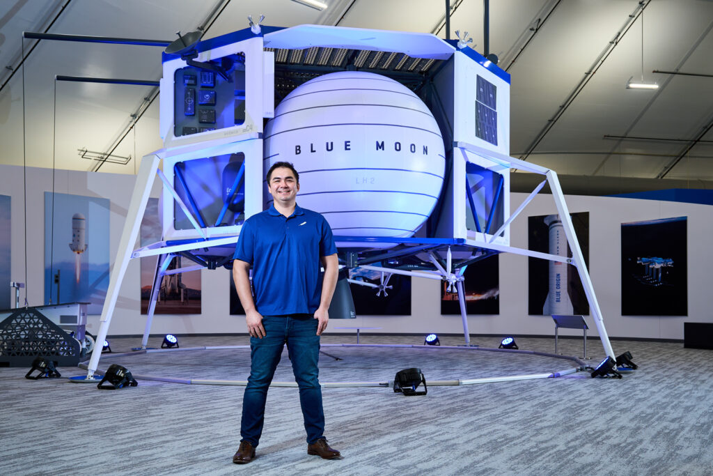 Reed Denny at Blue Origin's Kent, WA headquarters in front of a mockup of the Blue Moon lander.