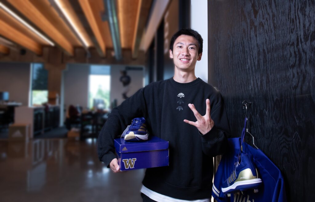 Zhihua Wang is a supply chain manager at adidas in Portland who collects UW merch.