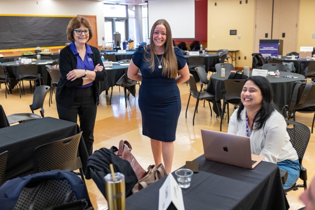 Louise Kapustka, Executive Director of the Executive MBA program (left) and Melinda Yormick behind-the-scenes before a business plan competition